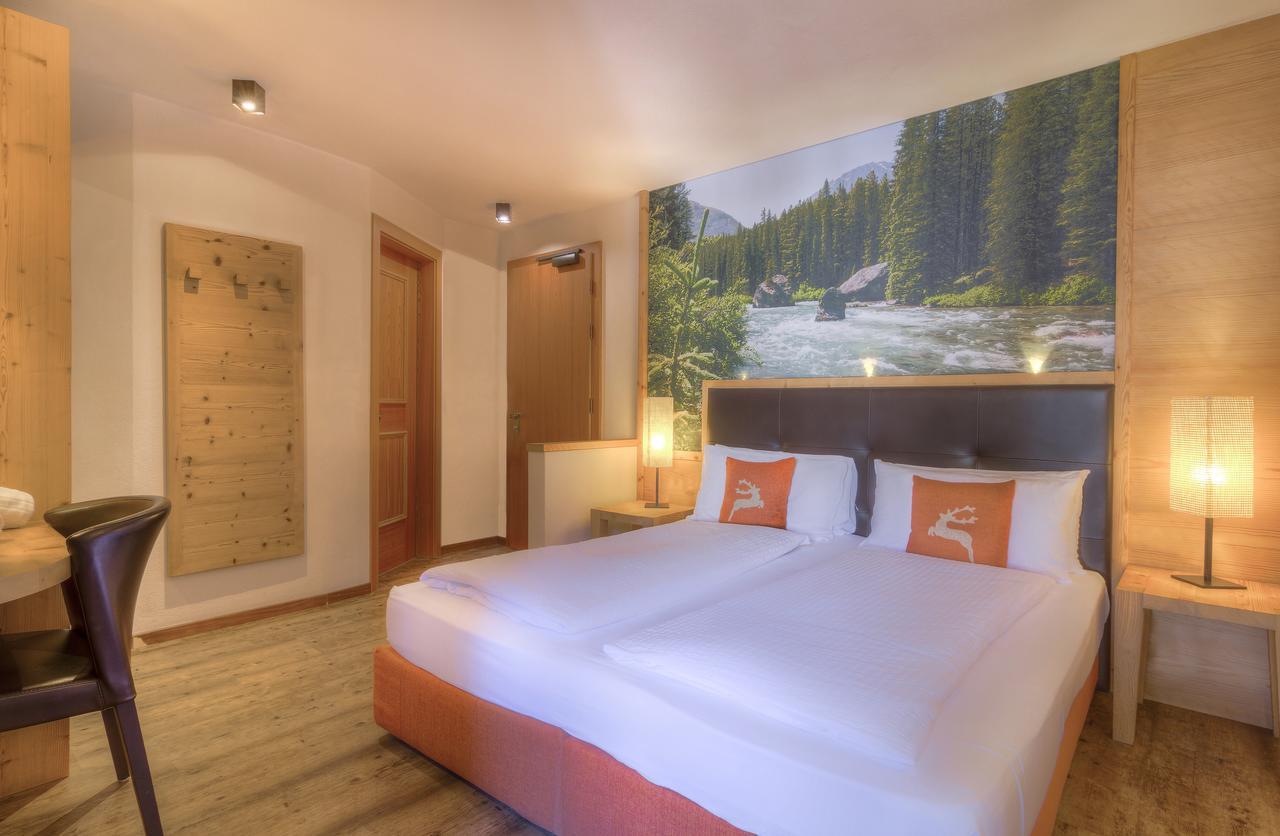 Hotel Madonnina Resort And Wellness Soraga Kültér fotó